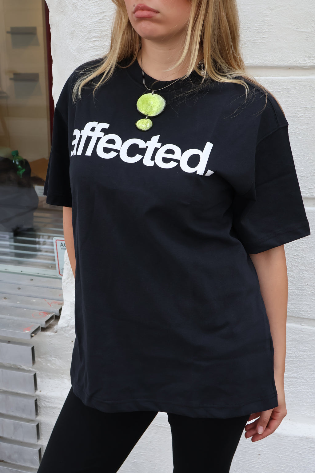 affected. UNISEX T-SHIRT