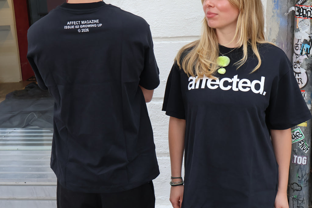 affected. UNISEX T-SHIRT
