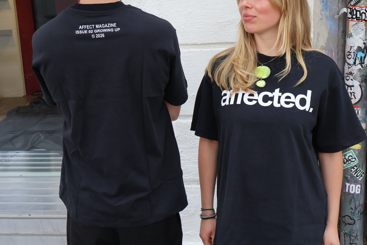 affected. UNISEX T-SHIRT