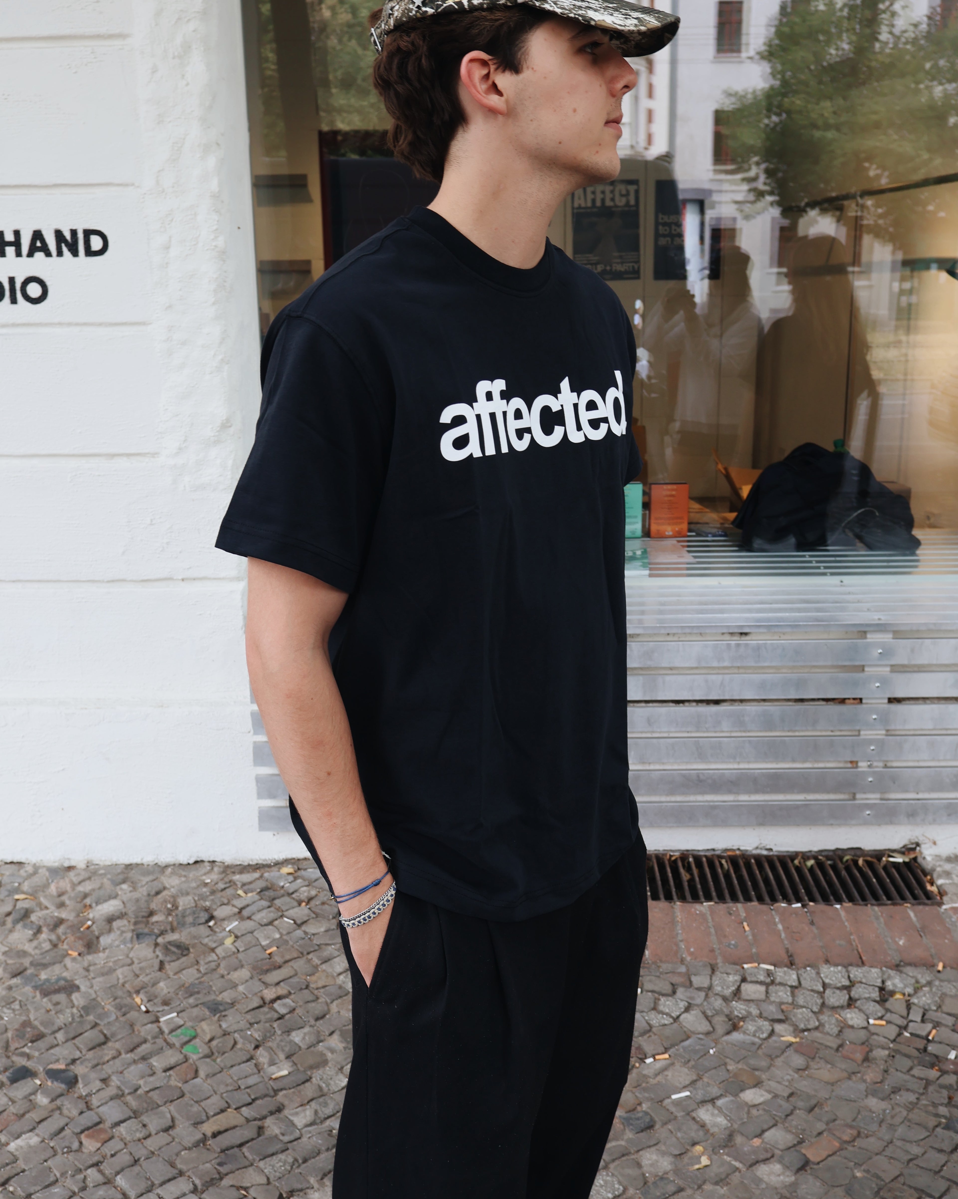 affected. UNISEX T-SHIRT