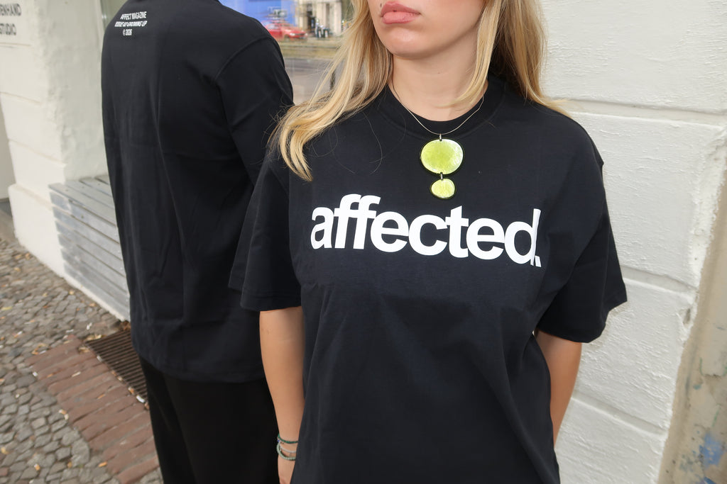 affected. UNISEX T-SHIRT