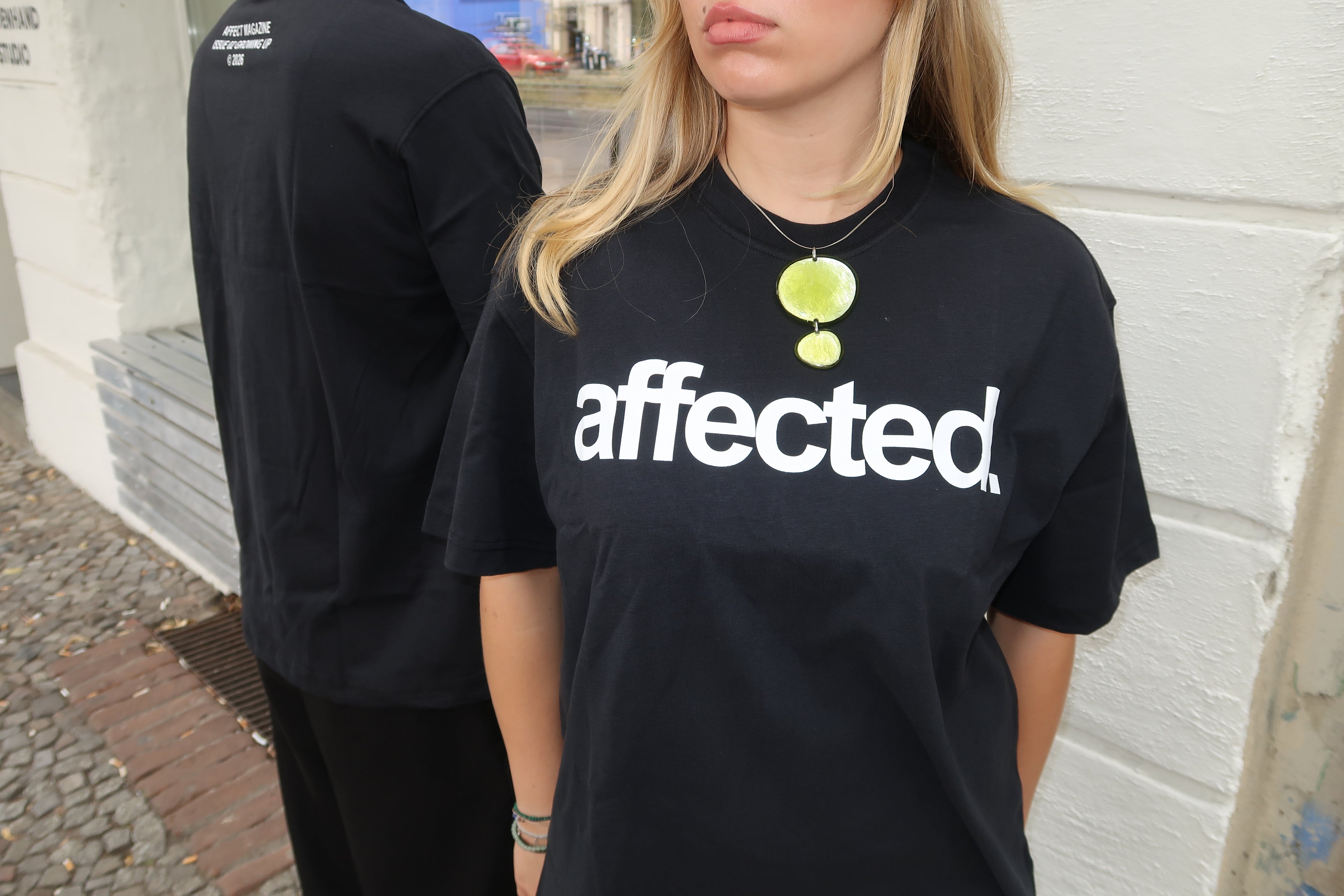 affected. UNISEX T-SHIRT